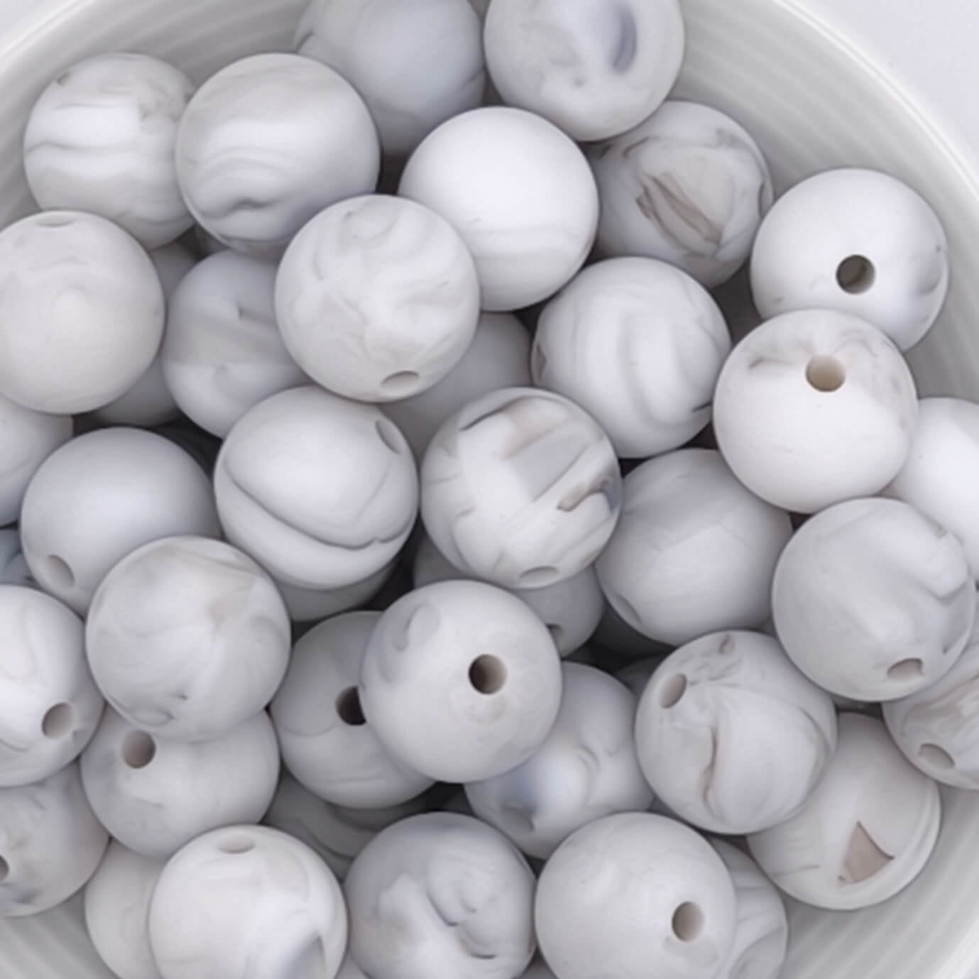 Silikonperle 12mm marmor 0 auf Lager